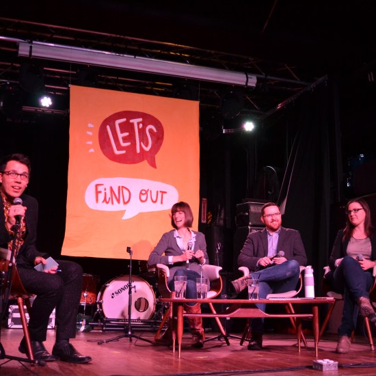 Chris asks a question for the audience.