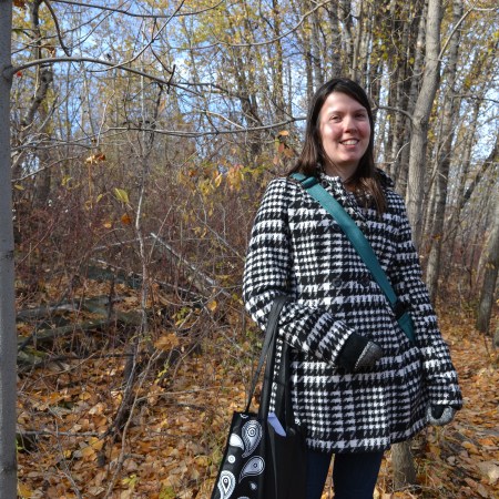 Brittany Romano, with the debris behind her.
