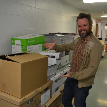 Braden Cannon showing off some of the Alberta Ballet records that the PAA hasn't had a chance to process yet.