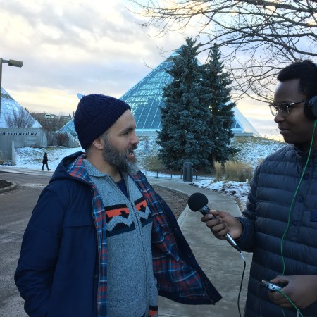 Russ Cobb in front of the Muttart pyramids, with Oumar Salifou.