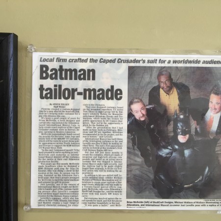 An article about the Batman story hangs on Mike's wall