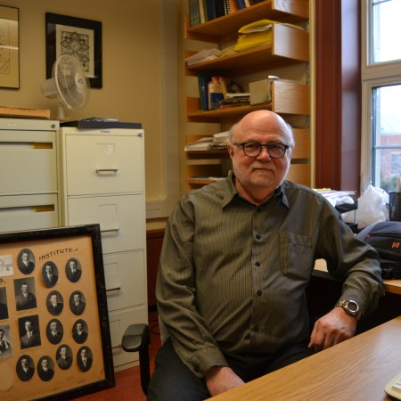 Jars smiles slightly, sitting down in his office