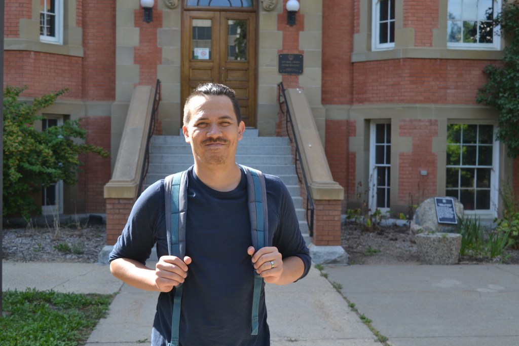 chris chang-yen phillips stands ready for school at the university of alberta. photo by finn phillips.