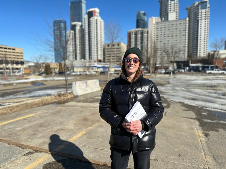 Danielle Soneff in a parking lot that will be part of Warehouse Park downtown